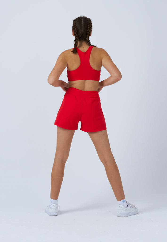 Mädchen & Damen und Gender Advantage Tennis Shorts mit Ballhalter, rot von SPORTKIND