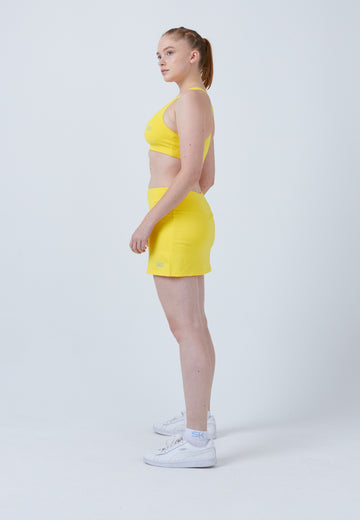 Mädchen & Damen und Gender Basic Tennisrock / Skort, gelb von SPORTKIND